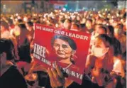  ?? AFP ?? A candleligh­t vigil on March 13 in Yangon.