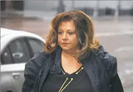  ?? Darrell Sapp/Post-Gazette ?? Abby Lee Miller arrives Friday at the U.S Courthouse on Grant Street, Downtown. Ms. Miller, star of “Dance Moms,” faces sentencing on charges that she hid assets and smuggled currency into the country.