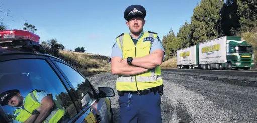  ?? PHOTO: STEPHEN JAQUIERY ?? The road ahead . . . New Otago Coastal team leader road policing Senior Sergeant Jared Kirk is urging drivers to buckle up, watch their speed and keep their hands off their phones this Queen’s Birthday Weekend.