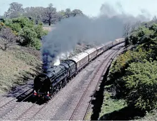  ?? FERNDALE MEDIA ?? BR Standard Class 8 Pacific No. 71000 Duke of Gloucester storms up Hatton bank on April 29, 1990 hauling the ‘Midlander II’ tour, the steam section being from Didcot to Derby.