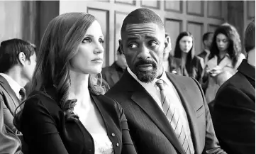  ??  ?? Jessica Chastain and Idris Elba in ‘Molly's Game'. — Courtesy of STXfilms