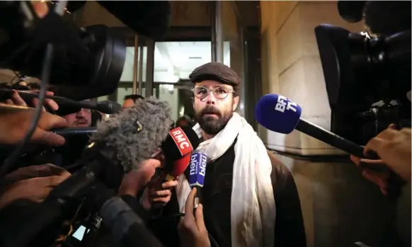  ?? VALERY HACHE/AFP/GETTY IMAGES ?? French farmer Cédric Herrou has become something of a folk hero around the French-Italian border for ferrying migrants across the border, under the nose of French police.