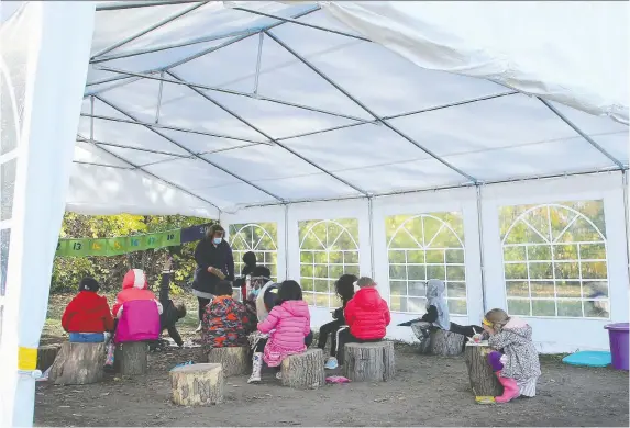  ?? PHOTOS: JULIE OLIVER ?? A couple of large tents have been set up outside Pierre Elliott Trudeau Elementary School in Gatineau, where children take some classes outside in the fresh air.