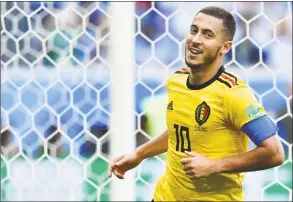  ?? Giuseppe Cacace / AFP / Getty Images ?? Belgium’s Eden Hazard celebrates after scoring their second goal in Saturday’s third- place game against England.