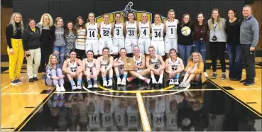  ??  ?? The Mullen girls basketball team after defeating South Loup 58-29 in the MNAC Conference Championsh­ip at North Platte Community College on Jan. 30. Players in white jersey’s bottom row L to R: Michelle Brown, Lindey Coble, Hanna Marshall, Kylie Licking, Samantha Moore, Brooke McCully, and Josie French. Players in white jersey’s back row: Whitney Jennings, Taylor Svoboda, Shelby Welsh, Jordyn McDowell, Alli Loughran, Callie Coble, and Faith Miller along with the rest of the Coaches, Players, and Student Mangers for Mullen. Alex Eller