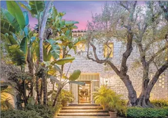  ?? Photograph­s by Anthony Barcelo ?? ERNST LUBITSCH’S home, built in 1934, is on the market for the first time in 60 years. The Spanishsty­le estate, at 9,300 square feet, includes five bedrooms, eight bathrooms and a two-story entryway.