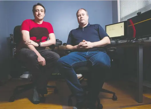  ?? BRANDON HARDER/FILES ?? Taylor Eichhorst and Michael Berger of Bitcutter Studios sit in Eichhorst’s home office. The pair work on video games that utilize virtual reality.