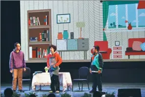  ?? PROVIDED TO CHINA DAILY ?? Huimin Middle School students in a play that was part of a contest aimed at promoting Shanghai dialect among youths.