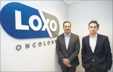  ?? Michael Cummo / Hearst Connecticu­t Media ?? Loxo Oncology founder and CEO Josh Bilenker, left, and Chief Business Officer Jacob Van Naarden inside the company’s headquarte­rs on Tresser Boulevard.