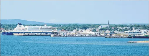  ?? JEREMY FRASER/CAPE BRETON POST ?? Marine Atlantic’s MV Atlantic Vision is docked at the North Sydney terminal on Aug. 7. This photo was taken from on board the MV Highlander­s, as the vessel left Cape Breton for Port aux Basques, N.L.