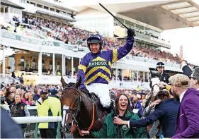  ?? Picture: Michael Steele/Getty ?? Derek Fox celebrates winning last year’s Grand National on Corach Rambler. This year’s race takes place on April 13