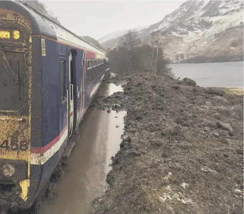 ?? PICTURE: PA ?? 0 A train was derailed in Lochaber when mud and debris washed across the line