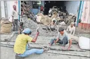  ??  ?? People continue to work at the Mayapuri scrap market with hardly any safety mechanism in place on Friday. SANJEEV VERMA/ HT PHOTO