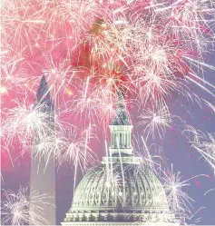  ??  ?? Fireworks explode over the National Mall as the US Capitol (right) and National Monument are seen in Washington, DC. — AFP photo