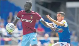  ??  ?? Tristan Nydam, right, in action for Ipswich against West Ham.