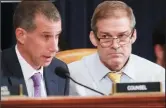  ?? KIRK MCKOY/LOS ANGELES TIMES ?? Republican counsel Steve Castor, left, and Jim Jordan (R-Ohio) ask questions of Gordon Sondland during the impeachmen­t inquiry of President Donald Trump on Wednesday.