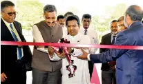  ??  ?? Industry and Commerce Deputy Minister Buddhika Pathirana cuts the ribbon to inaugurate the twin exhibition­s