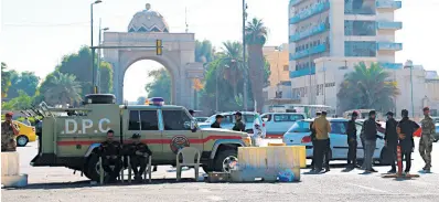  ?? AP ?? Iraqi security forces close the heavily fortified Green Zone as they tightened security measures, hours after the assassinat­ion attempt on Prime Minister Mustafa al-Kadhimi in Baghdad.