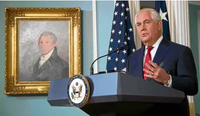  ?? AFP ?? US Secretary of State Rex Tillerson at his office to deny that he thought of resigning after calling Trump a “moron,” which Tillerson did not deny but said was “pretty nonsense”—