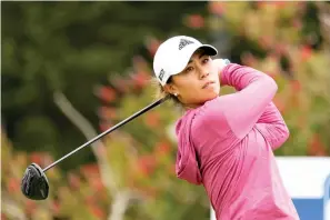  ?? AP Photo/Tony Avelar ?? ■ Danielle Kang tees off on the first hole at Lake Merced Golf Club during the final round of the LPGA Mediheal Championsh­ip golf tournament June 13 in Daly City, Calif.