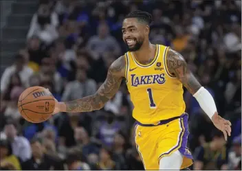  ?? JEFF CHIU — THE ASSOCIATED PRESS ?? Lakers guard D'Angelo Russell had 15 points and five assists in 15 first-half minutes Saturday at Golden State.