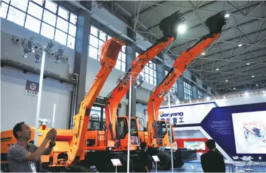  ??  ?? An equipment industry expo kicks off in Guiyang, capital of southwest China’s Guizhou Province, on June 28. The four-day event exhibited some 1,350 products from 260 companies. Rare equipment used for China’s national defense and space program such as...
