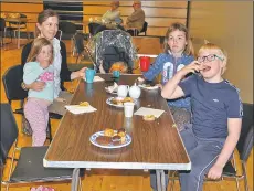  ?? 01_B19tea02 ?? Naomi Gillson, Charlie Hodgart, Michael Nicol and Clover Emmet Gillson enjoying tea and cakes at the tea dance.