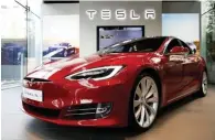  ?? - Reuters ?? GETTING READY: Overall sales of electric vehicles in the US remain stuck at less than 1 per cent of total vehicle sales, despite a growing number of models fielded by Tesla and other car makers.