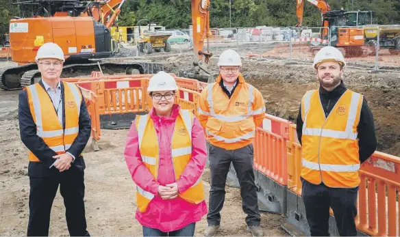  ?? ?? Councillor Claire Rowntree with the team from Esh.