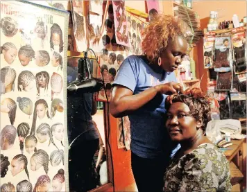  ?? PICTURE: REUTERS ?? One of the first dilemmas that black people face is whether to let strangers touch their hair – and under what circumstan­ces.