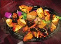  ?? ALANA HUDSON, SPECIAL TO THE HAMILTON SPECTATOR ?? Chicken tikka: marinated and grilled just right.