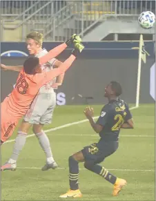  ?? PETE BANNAN – MEDIANEWS GROUP ?? Union goalkeeper Andre Blake here making a nifty save against the Red Bulls in April, was sharp again Sunday in a shutout of Inter Miami.