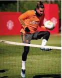  ??  ?? Juan Mata, top, and Alex Telles were both pictured in training this week