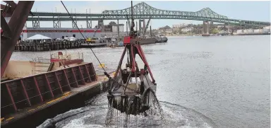  ?? HERALD pOOL pHOTOS, ABOVE AND BELOW; STAFF pHOTO By NICOLAuS CZARNECKI, BOTTOm ?? DREDGING UP BUSINESS: With Gov. Charlie Baker, below at right, looking on, crews have begun deepening Boston harbor to allow for the admission of larger container ships.