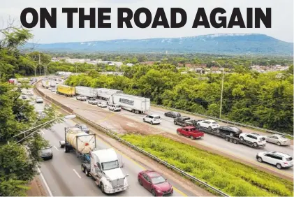  ?? STAFF PHOTO BY ERIN O. SMITH ?? Heavy traffic hits both eastbound and westbound commuters Thursday along Interstate 24.