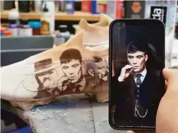  ?? Jailene Cuevas / Hearst Connecticu­t Media ?? Peaky Blinkers inspired cleats made for Buffalo Bills’ Gabe Davis by Daniel”Mache” Gamache at his warehouse in New Haven County on Sept. 1.