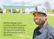  ?? STAFF PHOTO BY C.B. SCHMELTER ?? Montana Morgan, who is hosting an Alton Park reunion picnic at the park, poses at the new park located at the site of the former Charles A. Bell School.