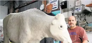  ??  ?? IN PROGRESS: Alain Colf (left) and sculptor Paul Stumkat with a model bullock Paul has created.