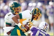  ?? The Dallas Morning News/Vernon Bryant ?? North Dakota State cornerback Marquise Bridges (9) intercepts a pass on Jan. 6, 2017, intended for James Madison wide receiver Ishmael Hyman (13) as North Dakota State linebacker Jabril Cox (42) closes in on the play during the third quarter in the FCS championsh­ip NCAA game at Toyota Stadium in Frisco, Texas.