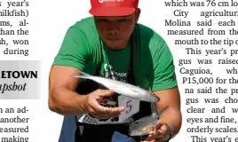  ?? WILLIE LOMIBAO/INQUIRER NORTHERN LUZON ?? RYAN Doria competes in the milkfish classifyin­g contest during the Bangus Rodeo, one of the events in this year’s Bangus Festival in Dagupan City.