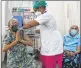  ??  ?? A nurse administer­s vaccine jab to a senior citizen at Nair Hospital. Photo: Bhushan Koyande