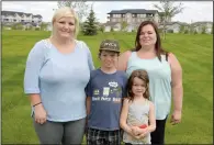  ?? NEWS PHOTO EMMA BENNETT ?? Korilyn Steele (left to right), Jake Christians­on, Paige Christians­on, and Ashley Christians­on were part of a team from the community who searched for a missing elderly woman on August 16.