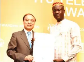  ??  ?? From left: Mr. Houlin Zhao Secretary General Internatio­nal Telecommun­ication Union (ITU) Eng. Austin Nwaulune Director Spectrum Admin Nigerian Communicat­ions Commission (NCC) during the Presentati­on of award of recognitio­n to the Commission at the...