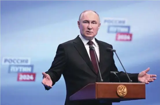  ?? NATALIA KOLESNIKOV­A/POOL/AFP ?? Vladmir Putin, reeleito presidente russo
