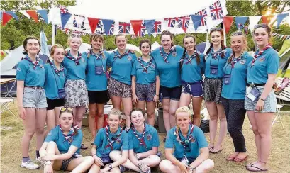  ??  ?? ●● Charlotte Jefferies, from 3rd Poynton Guides, sixth from left, with other girls from the Girlguidin­g Associatio­n’s Cheshire Border contingent