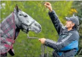  ?? PHOTO/ FILE ?? Rotorua’s Bill Pomare with oneof his horses in 2013.