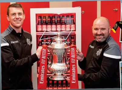  ?? PA ?? Up for the Cup: striker Niall Cummins and manager Neil Young pose with the trophy