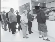  ??  ?? Customers line up during the grand opening of Palermo Street Foods in San Jose.