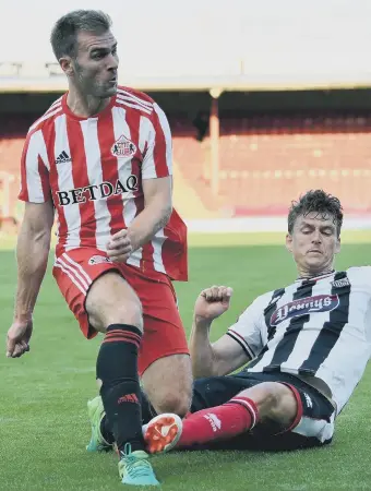  ??  ?? Callum McManaman delivers a cross in his final Sunderland appearance, at Grimsby in midweek.