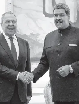  ?? AP ?? Venezuelan President Nicolas Maduro (right) meets with Russia’s Foreign Minister Sergey Lavrov at Miraflores presidenti­al palace in Caracas, Venezuela, yesterday.